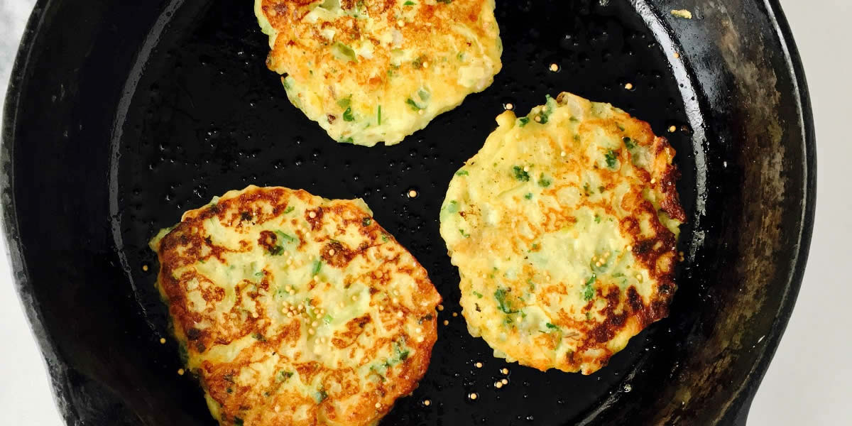 Mashed Potato Cabbage and Mustard Pancakes in fry pan