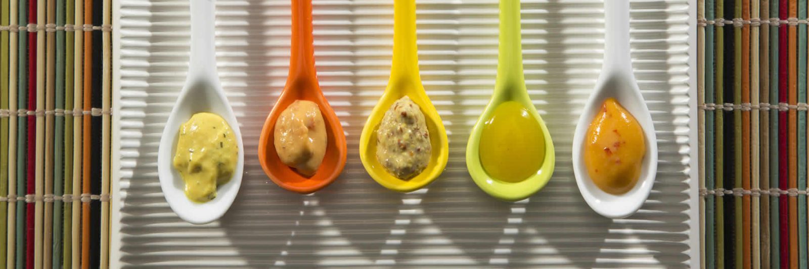 Types of Mustard in spoons