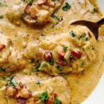 smothered-pork-chops-in-bacon-and-onion-gravy